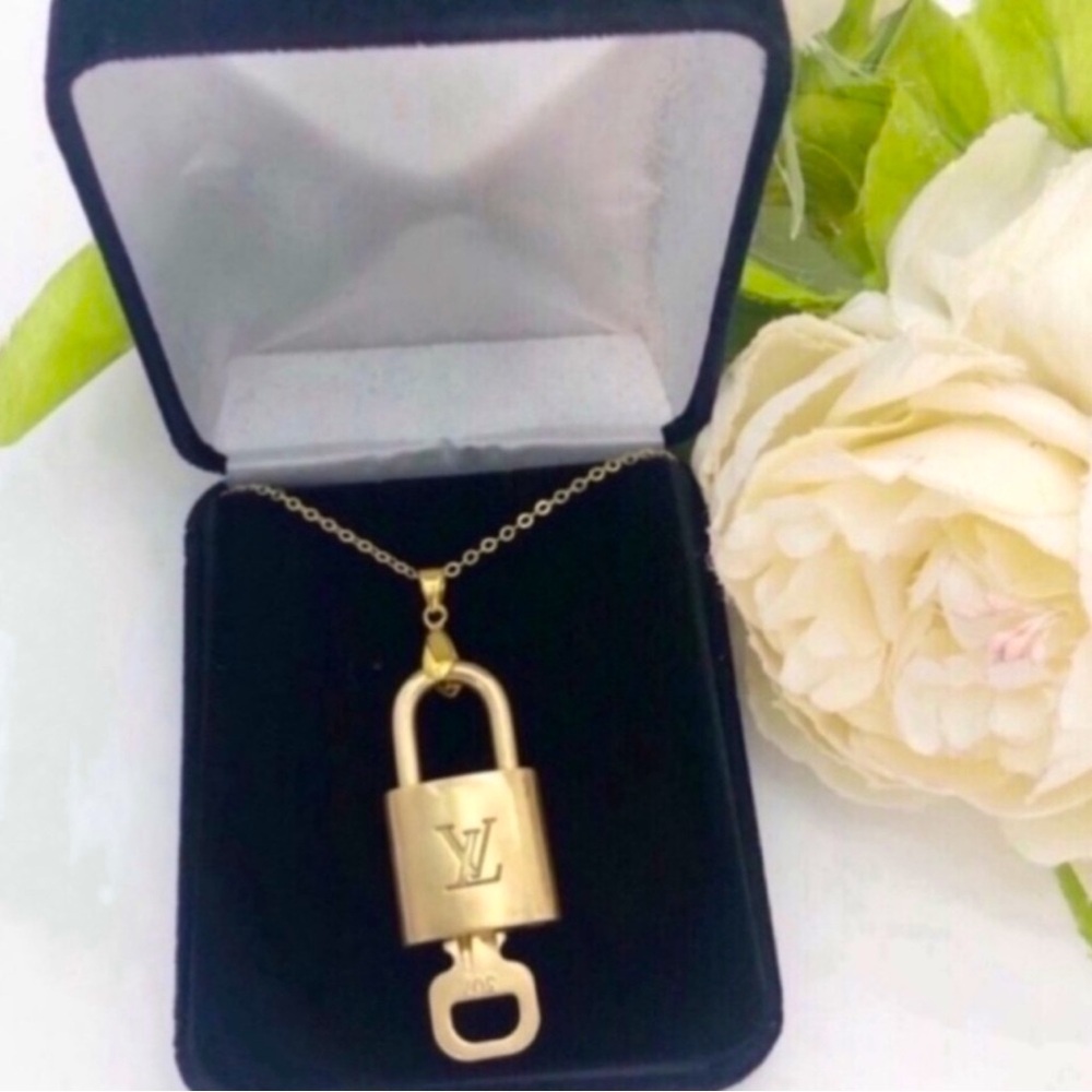 - Louis Vuitton lock & key with gold necklace